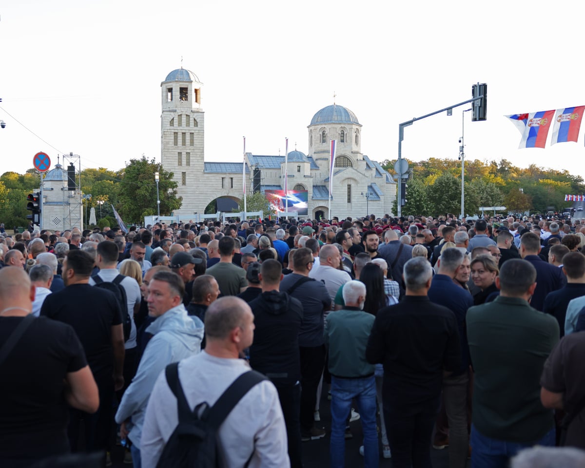 People gather during the funeral for Ratko Mladić in Belgrade, Serbia.