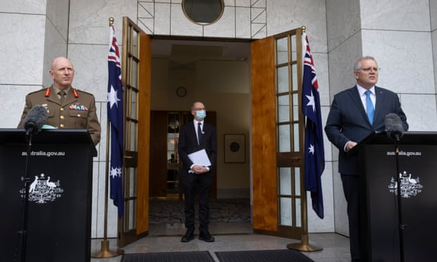 Lieutenant General John Frewen, the CMO Paul Kelly and Scott Morrison. Australian military, Vaccines and immunisation, Health, Coronavirus,Lieutenant General Frewen ,COVID Vaccine,scott Morrison,harbouchanews