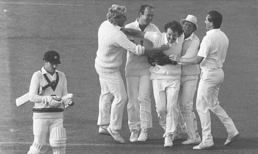 Richard Ellison is mobbed by his England teammates after taking the wicket of Australia’s Allan Border in 1985.
