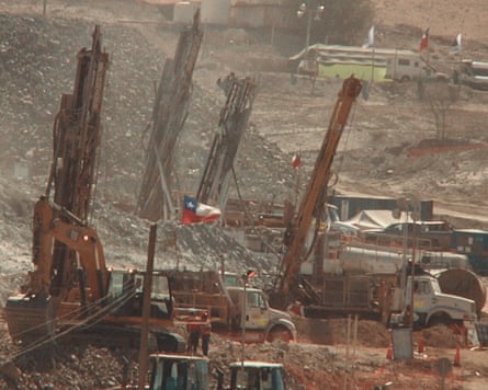 The drilling site with excavators and drillers in Chilean Mine Rescue: Race Against Time