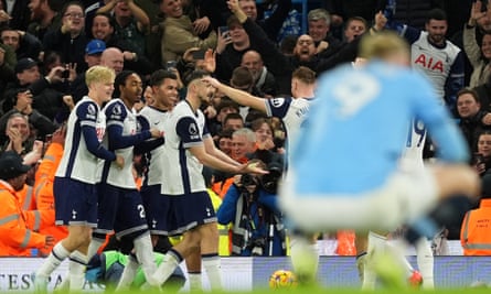 Tottenham Hotspur’s Brennan Johnson (third left) celebrates with teammates after scoring their side’s fourth goal of the game