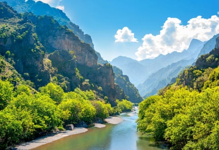 Mountains in Greece with a river flowing through the middle
