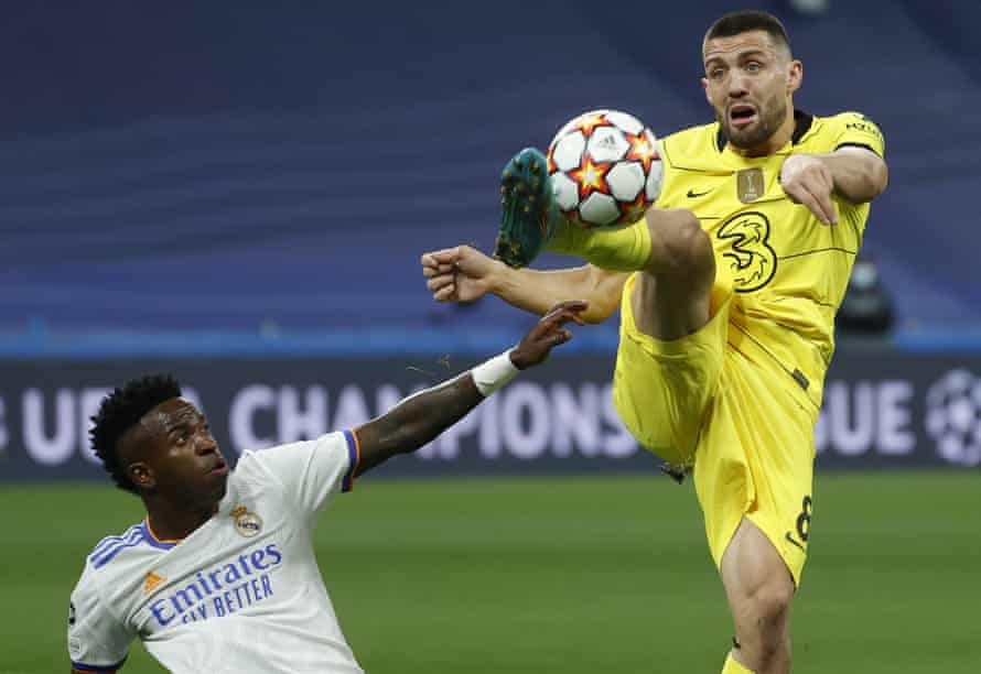 Real Madrid’s striker Vinicius Jr (left) is beaten to the ball by Chelsea’s midfielder Mateo Kovacic.