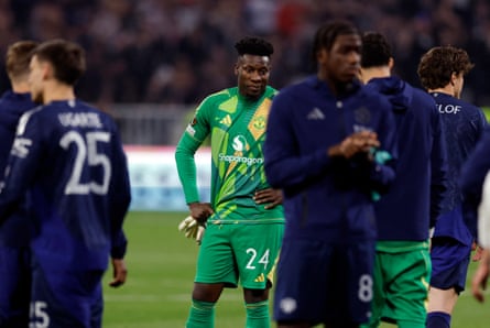 Manchester United’s André Onana cuts a forlorn figure after the draw in Lyon