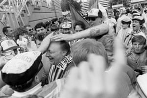Labour leader Neil Kinnock, sporting a Tottenham Hotspur scarf, is swamped by enthusiastic Coventry City fans ahead of the 1987 Cup Final.