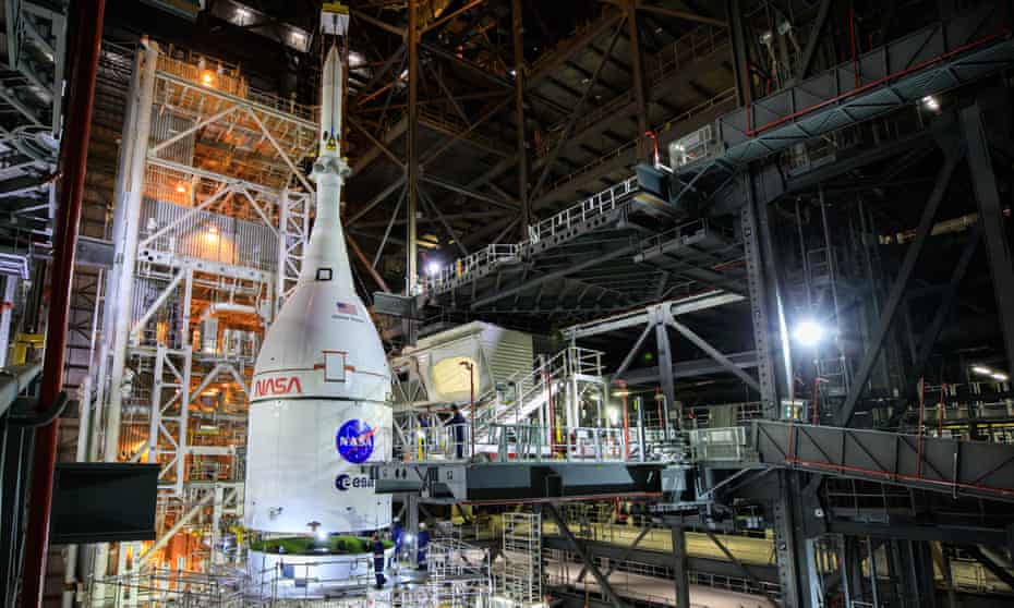 Nasa adds Orion to the top of the Space Launch System for the first Artemis moon mission.