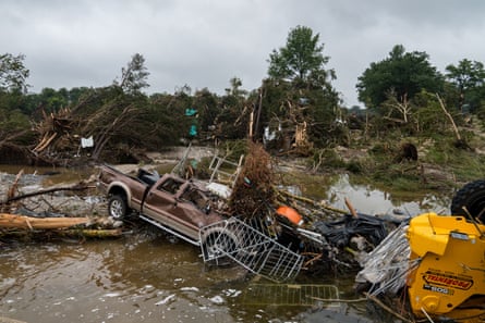 flood waters left debris including vehicles and equipment scattered