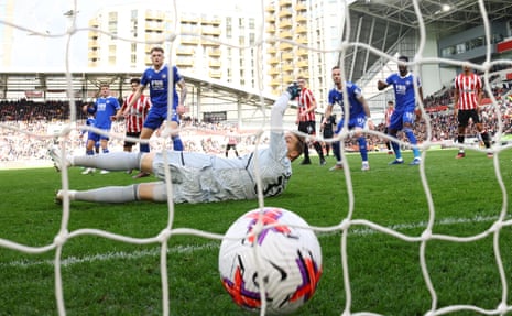 Mathias Jensen of Brentford shoots and scores his side’s first goal, via a deflection, in the 32nd minute to make it 1-0.