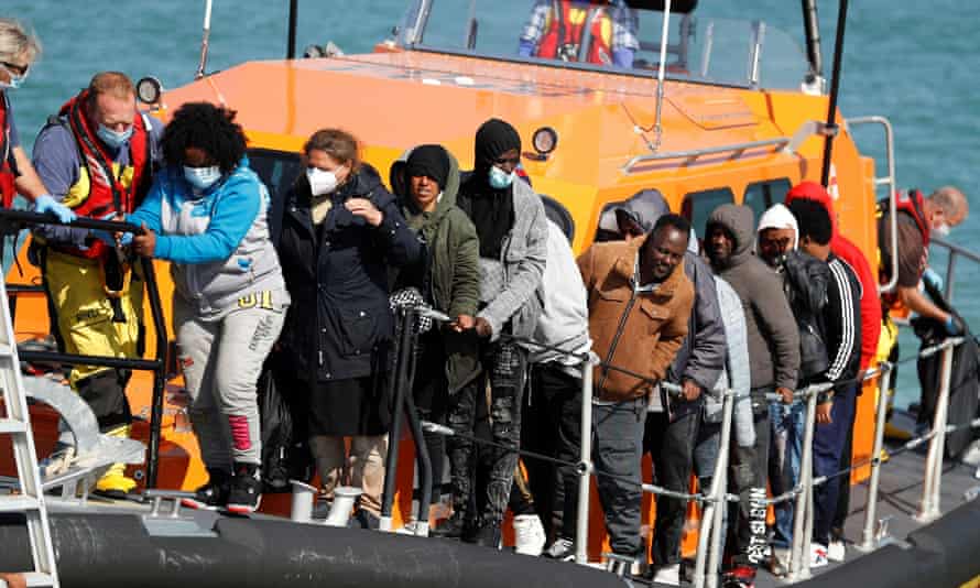 Migrants at Dungeness who were rescued by the Royal National Lifeboat Institution