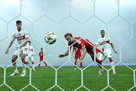 Bayern MunichâÂÂs Harry Kane heads home against Stuttgart