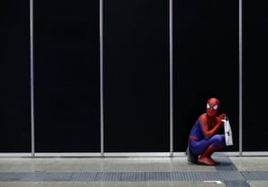 A man in a Spider-Man costume