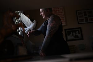Tattoo artist Alison Manners is photographed at her home in Brisbane. Alison has lost many of her possessions when the house she lived in was inundated by flood water earlier this year.