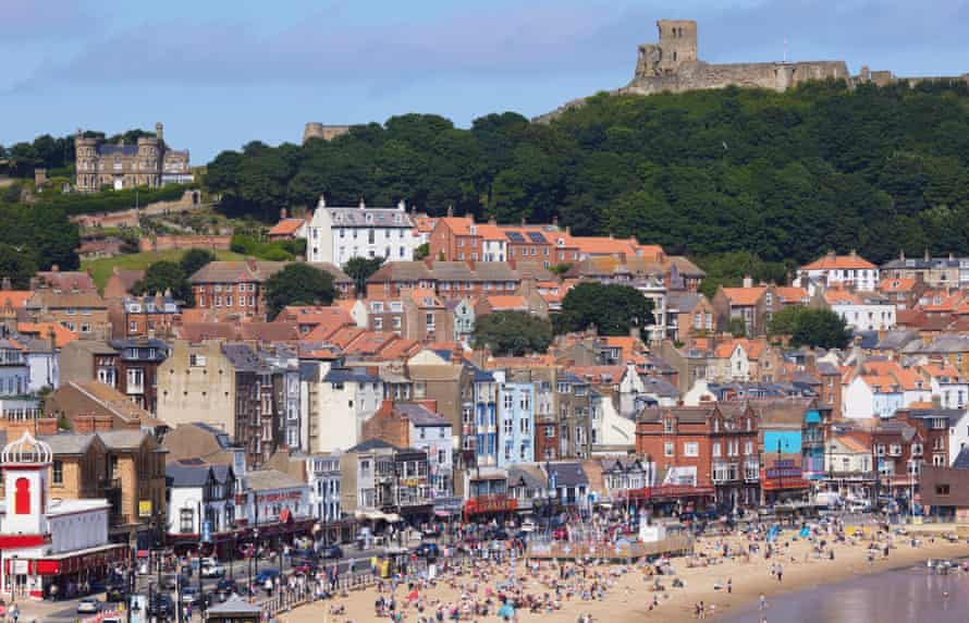 The busy sandy beach at South Bay, Scarborough.