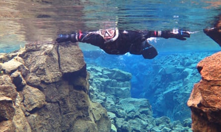 Kim-Joy swimming in the Silfra fissure – between the North American and Eurasian tectonic plates.