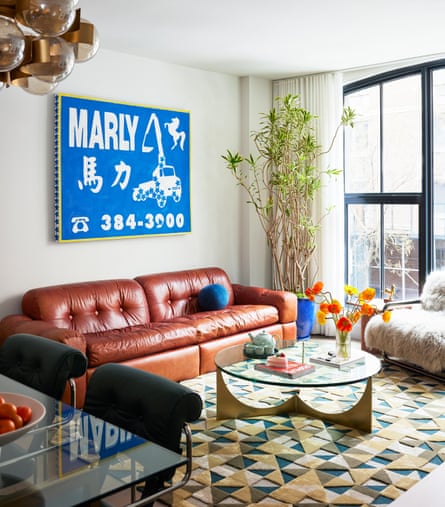 coffee table and couch on patterned rug in living room