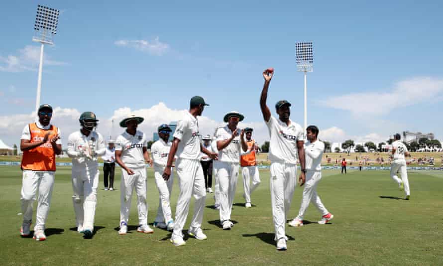 Ebadot Hossain leaves the field with the ball after taking six wickets for 46 runs