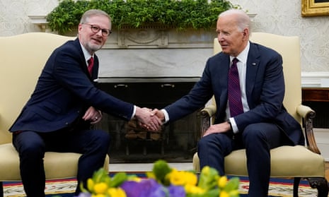Joe Biden shakes hands with Czech Prime Minister Petr Fiala in the Oval Office at the White House, in Washington, moments ago.