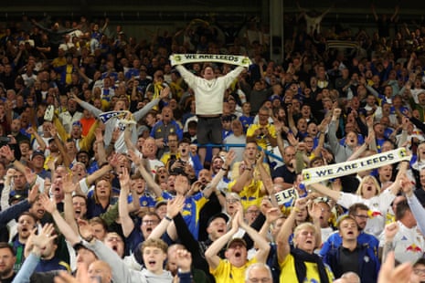 Leeds United fans celebrate victory following the Premier League match against Everton at Elland Road.