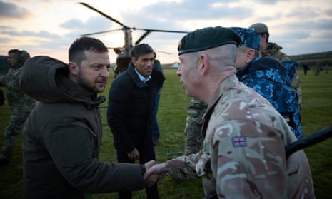 Ukrainian president Volodymyr Zelenskiy and Rishi Sunak meet Ukrainian troops being trained to use Challenger tanks in Dorset on 9 February, 2023.