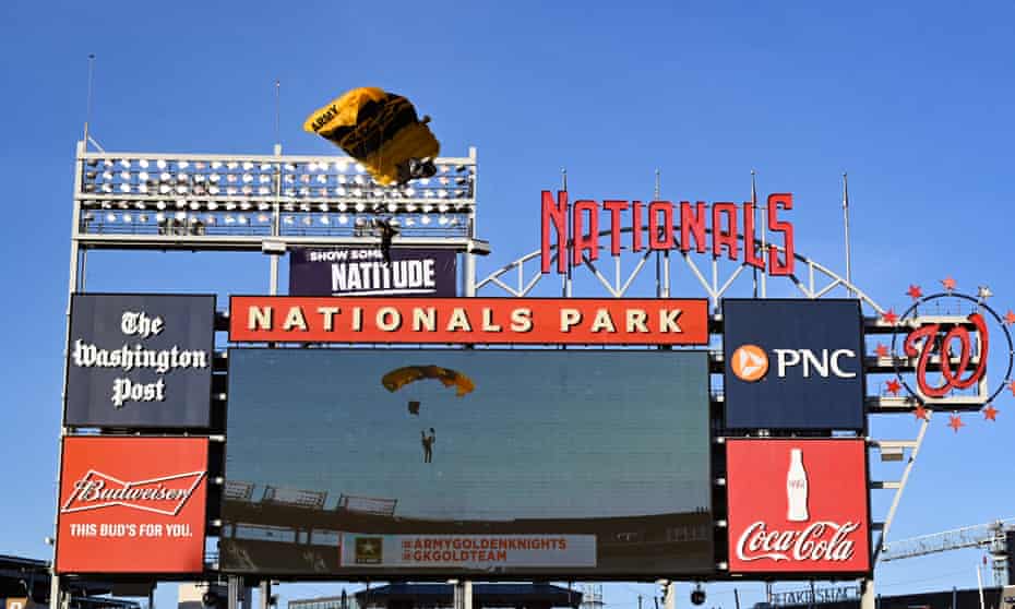 A member of the US Army parachute team lands at Nationals Park on Wednesday. The display caused an alert in Washington DC