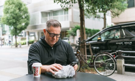 Justin McCurry and Hammy stop at a cafe for coffee