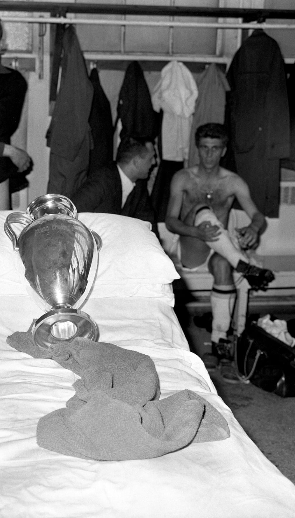 The European Cup lies on the physio table in the Milan dressing room following their 2-1 victory over Benfica in the 1963 European Cup Final
