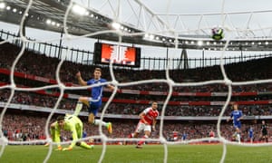 Arsenal’s Alexis Sanchez scores their first goal.