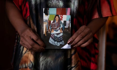 Hasenaar with a picture of her mother, Samina Begum.