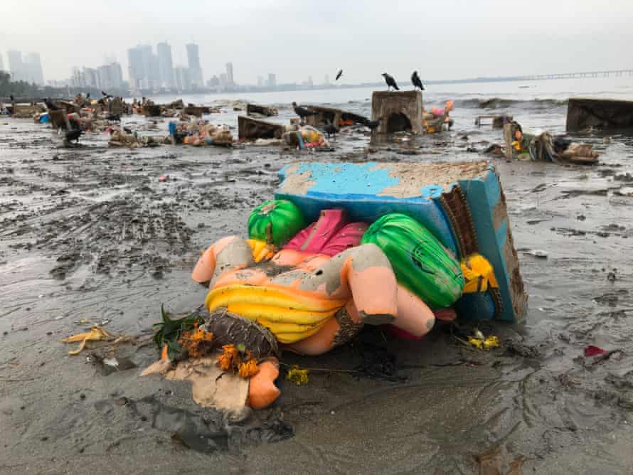 The aftermath of idol immersion on Mahim beach, Mumbai, in 2018.