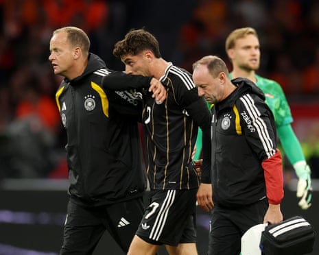 Kai Havertz is flanked by two physios after picking up an injury during Germany’s Nations League draw with the Netherlands.