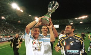 Diego Simeone, Giuseppe Pancaro and Angelo Peruzzi celebrate after winning the Italian Supercup in 2000.