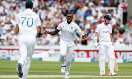 Lungi Ngidi celebrates after taking the wicket of England's Joe Root