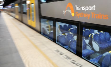 A Transport Sydney train pulls in to a station