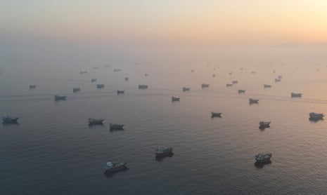 A drone view shows vessels in the Strait of Hormuz, as seen from Musandam, Oman, 15 June 2026.