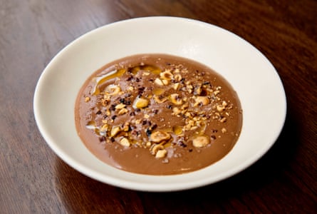 Marjorie’s basking cocoa mousse topped pinch hazelnuts and oliva oil.