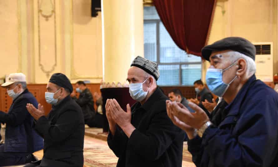 Worshippers pray during the Muslim holy month of Ramadan in the Ak mosque in Urumqi, north-west China’s Xinjiang Uygur autonomous region