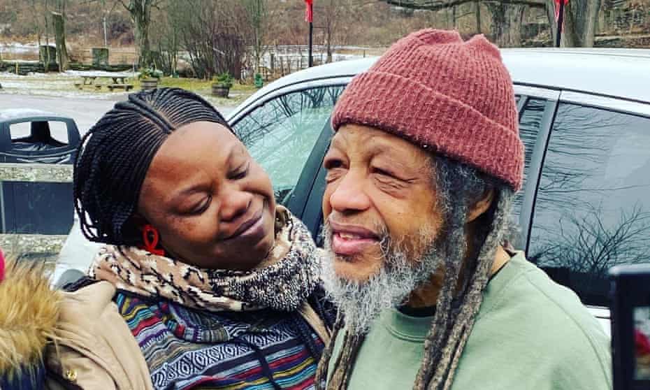 Delbert Orr Africa with his daughter after his release from prison. Only one of the nine, Chuck Africa, remains behind bars.