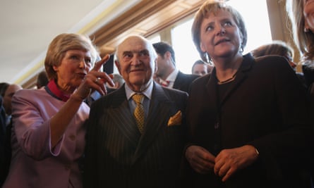 Friede Springer, left, Lord Weidenfeld and the German chancellor Angela Merkel attending the annual new year reception at the publishing group Axel Springer in Berlin in 2008.