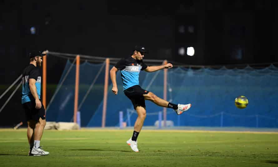 New Zealand’s Tim Southee has a shot as Kane Williamson watches on during a football match at the team’s net session ahead of the T20 World Cup final.