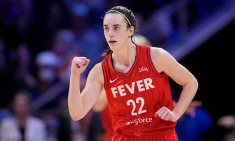 The Indiana Fever's Caitlin Clark celebrates during the second half of Wednesday’s game against the Dallas Wings in Arlington, Texas.