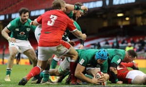 Tadhg Beirne goes over to score Ireland’s first try.