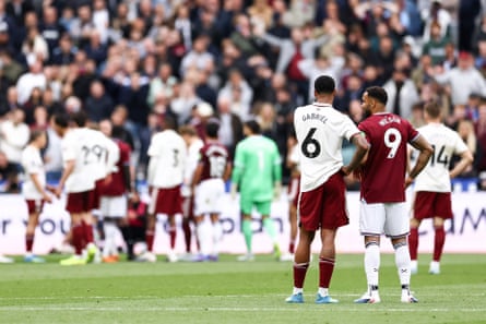 Gabriel Magalhães and Callum Wilson wait for the outcome of the fateful VAR check at the London Stadium