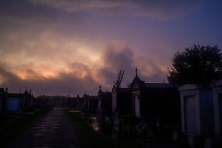 Clouds move over a cemetery as the remnants of Hurricane Zeta sweep through New Orleans.
