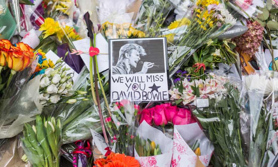 Flowers at a makeshift memorial outside the apartment building where David Bowie lived in New York.