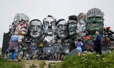 Mount Recyclemore, a giant sculpture of Boris Johnson, Joe Biden and fellow G7 leaders on a clifftop near Carbis Bay, Cornwall.