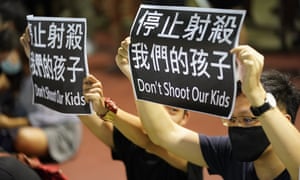 A protest against a teenage demonstrator being shot at close range in the chest by a police officer in Hong Kong on 1 October.