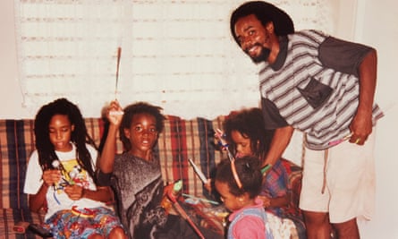 From left: Safiya Sinclair, aged 11, with her siblings Lij, nine, Shari, two, Ife, seven, and father Djani, aged 33, at Porto Bello, in Montego Bay, Jamaica.