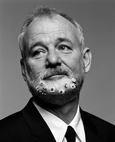 Bill Murray looking sad with flowers woven into his beard