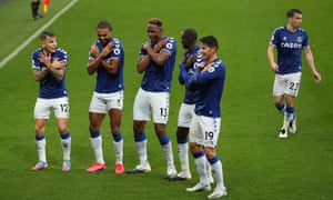 Everton players celebrate Yerry Mina’s goal against Brighton.