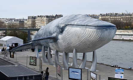 A giant whale sculpture next to the river Seine in Paris.